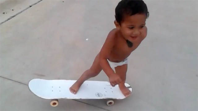 2-year-old skateboarder shows his skills